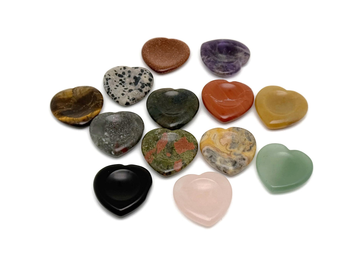 Natural crystal worry stone from GemstoneGO with soothing heart chakra energy, ideal for stress relief and travel relaxation.