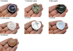 Natural crystal worry stone from GemstoneGO, soothing heart chakra travel crystal for stress relief and relaxation.