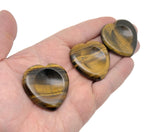 Tiger Eye heart worry stone from GemstoneGO, a soothing crystal with polished finish, designed for stress relief and meditation.