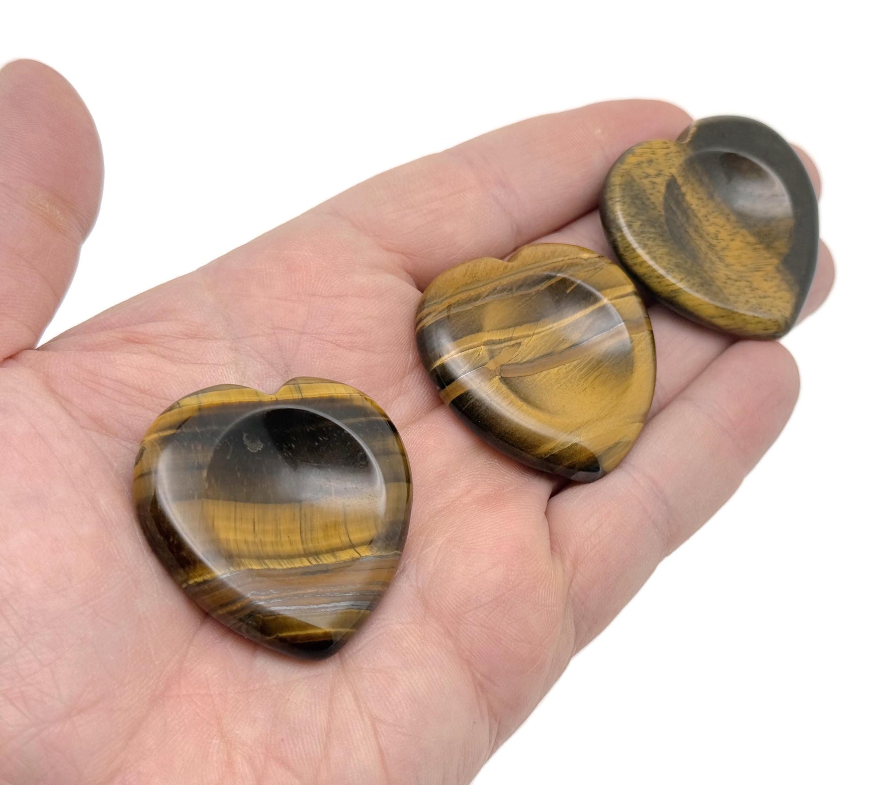 Tiger Eye heart worry stone from GemstoneGO, a soothing crystal with polished finish, designed for stress relief and meditation.