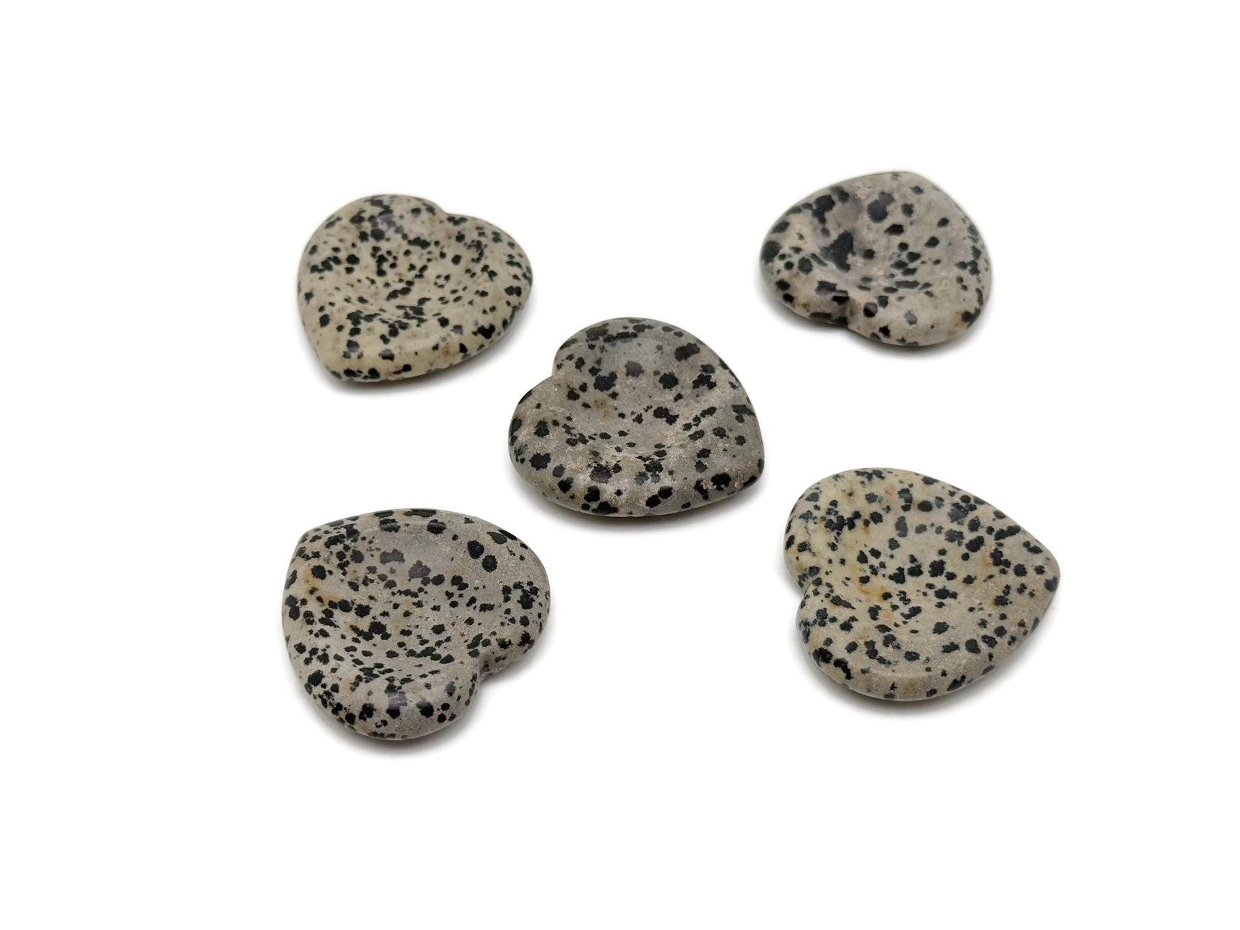 Dalmatian Jasper heart worry stone by GemstoneGO, featuring black and beige spotted crystal for stress relief and soothing energy.
