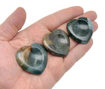Moss agate heart-shaped worry stone from GemstoneGO, featuring calming green and brown crystal patterns, smooth polished surface.