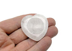 Clear quartz heart worry stone from GemstoneGO, smooth soothing crystal with polished surface for stress relief and meditation.