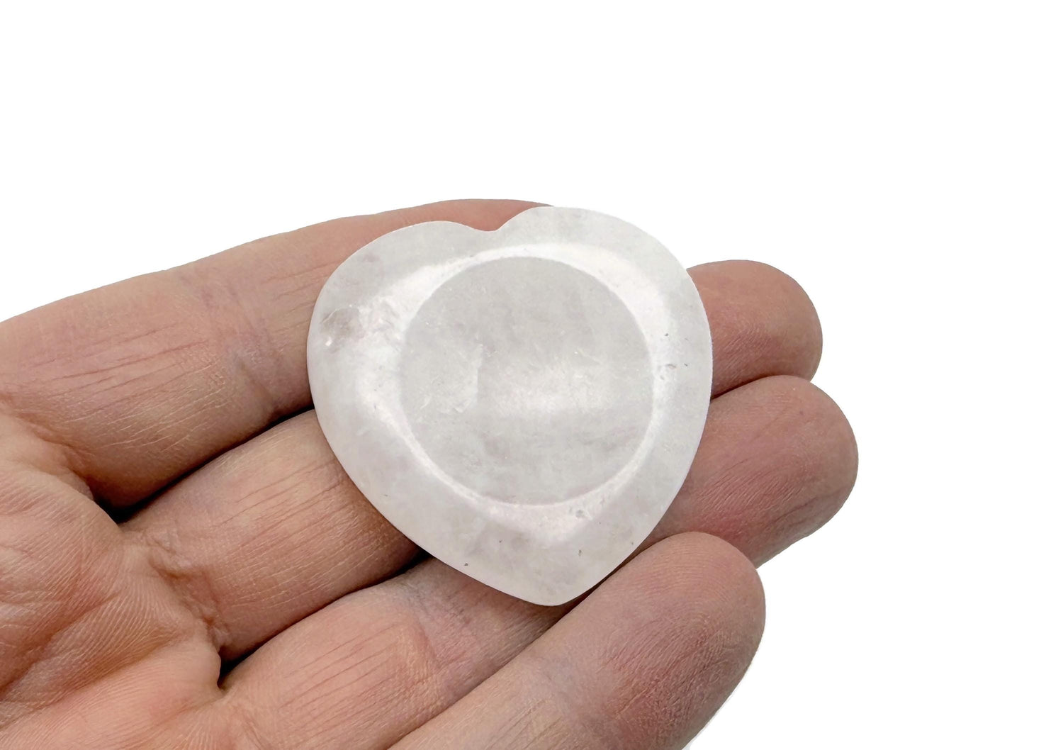 Clear quartz heart worry stone from GemstoneGO, smooth soothing crystal with polished surface for stress relief and meditation.