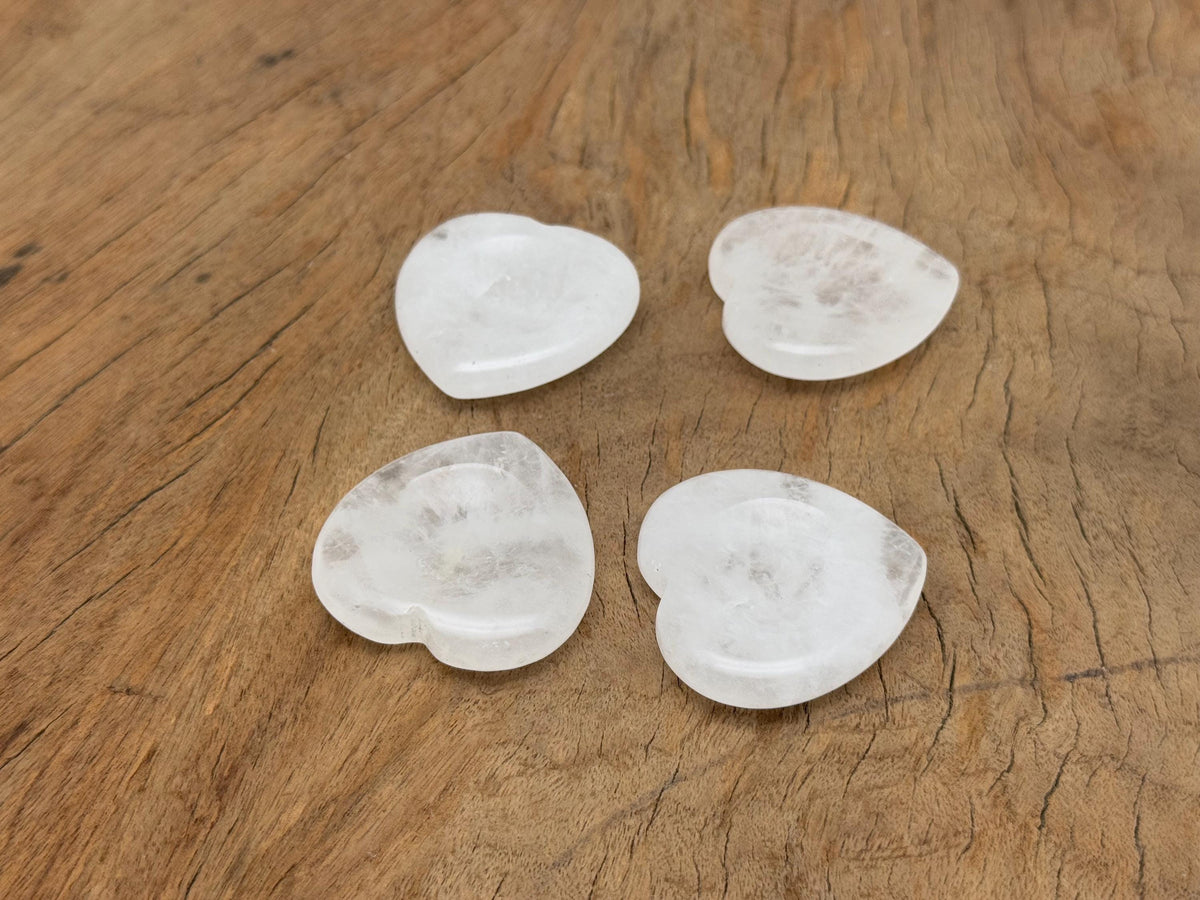 Clear quartz heart worry stone from GemstoneGO, soothing crystal with polished surface for stress relief and meditation.
