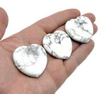 Smooth howlite heart worry stone from GemstoneGO, soothing crystal with polished surface and calming appearance.