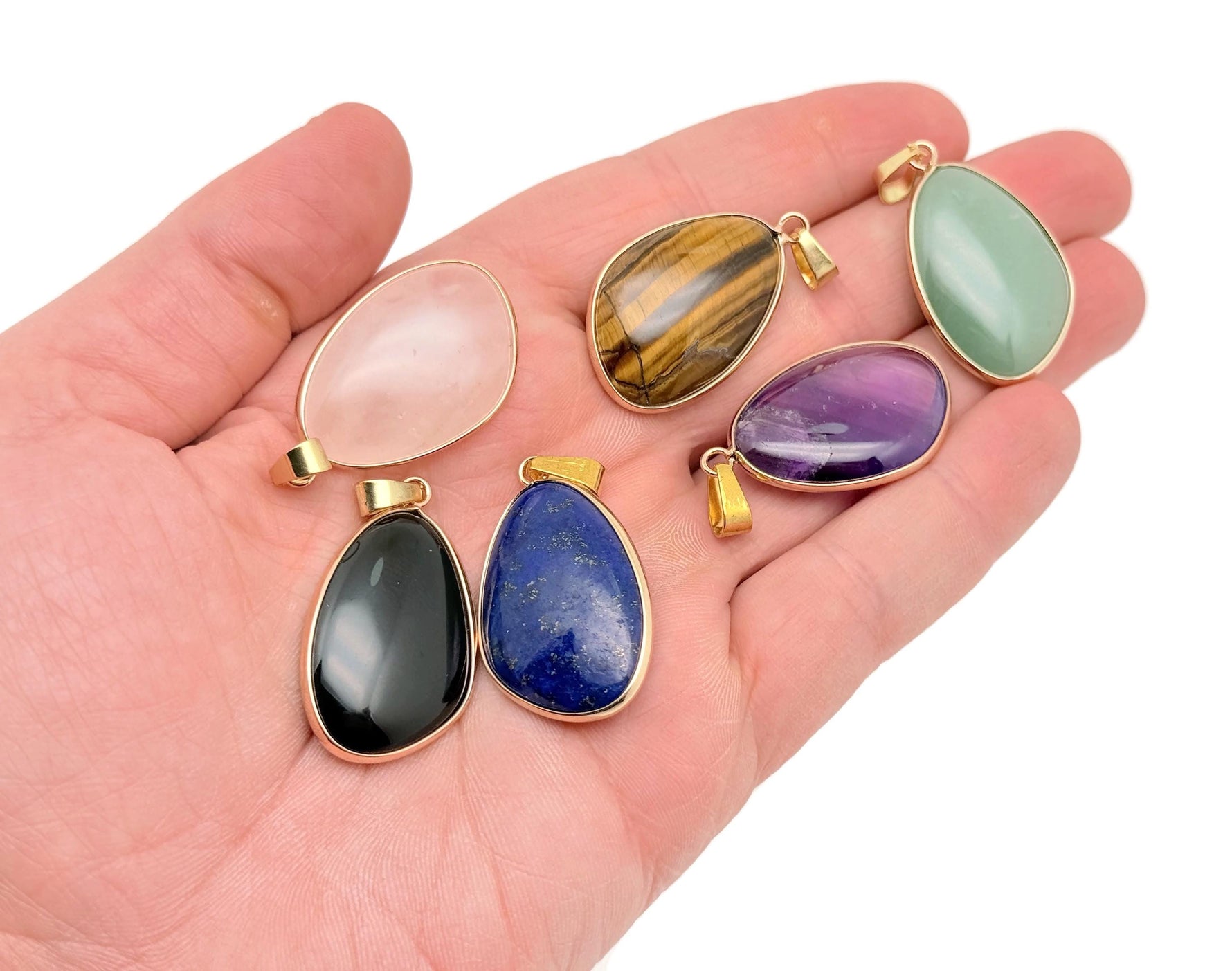 Dainty gemstone pendant in gold and silver with a birthstone charm, perfect for jewelry DIY and charm collection by GemstoneGO