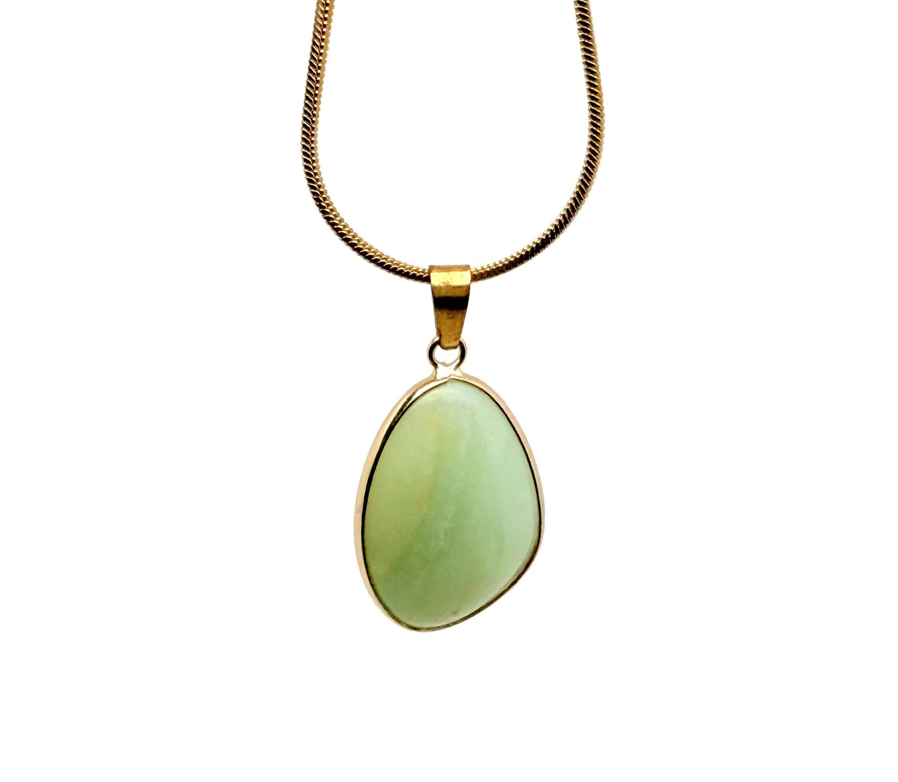 Dainty Amazonite gemstone pendant with gold setting, showcasing a natural blue-green stone on a jewelry display.