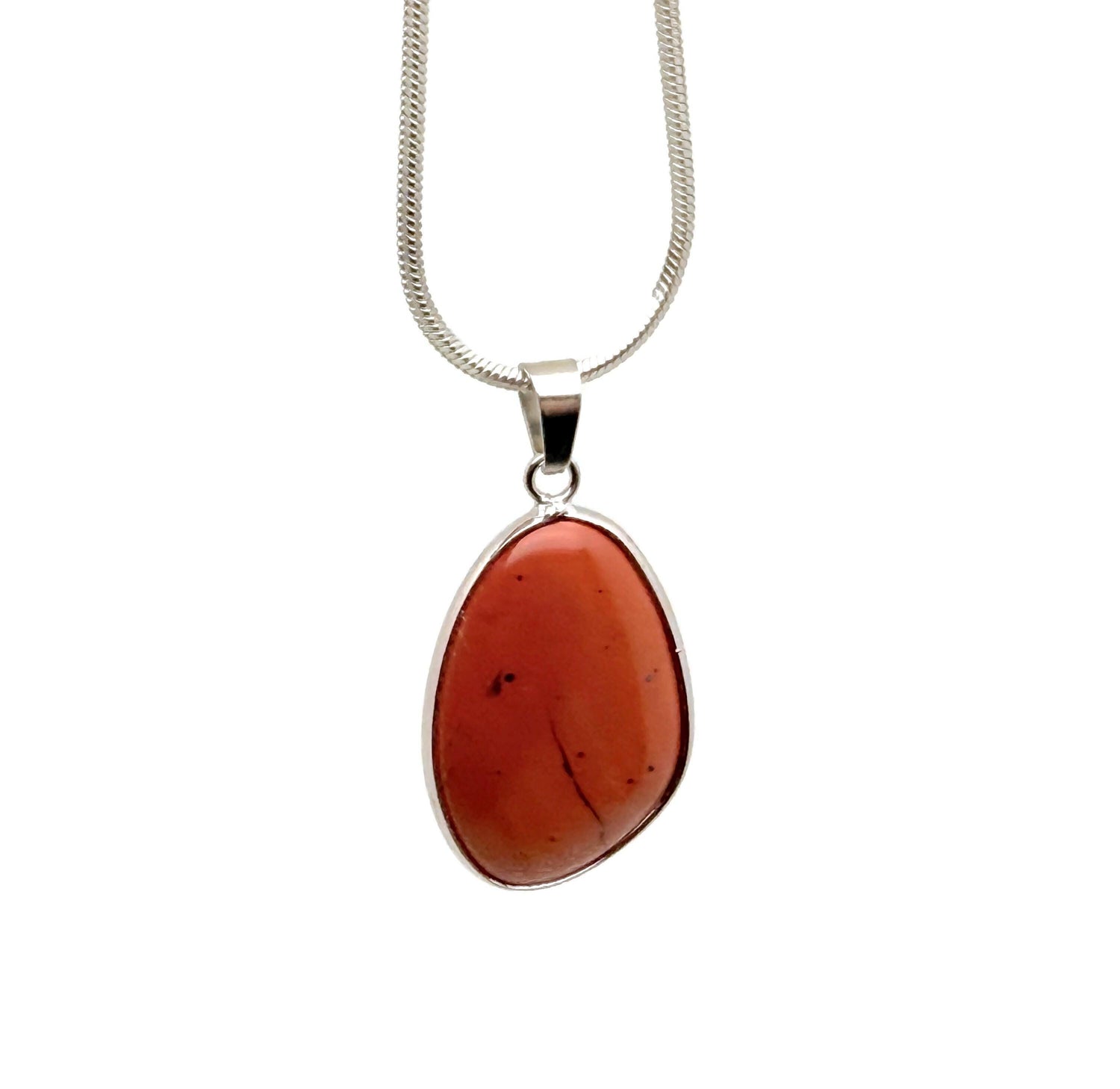 Red Jasper silver gemstone pendant with dainty design, showcasing a polished red jasper stone on a silver setting.