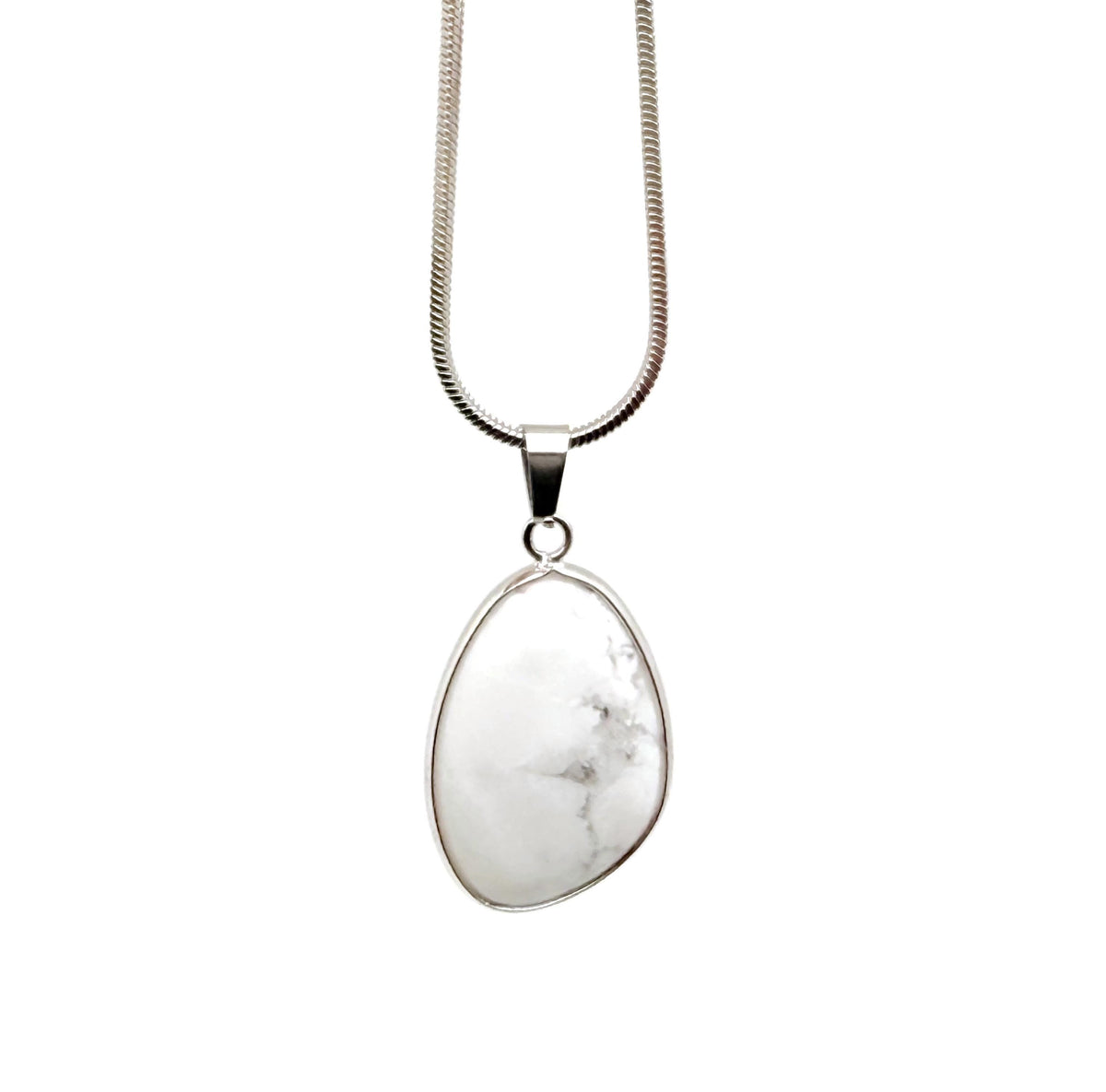 Dainty Howlite silver gemstone pendant from GemstoneGO, showcasing a smooth white stone charm with silver setting for jewelry making