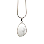 Dainty Howlite silver gemstone pendant from GemstoneGO, showcasing a smooth white stone charm with silver setting for jewelry making