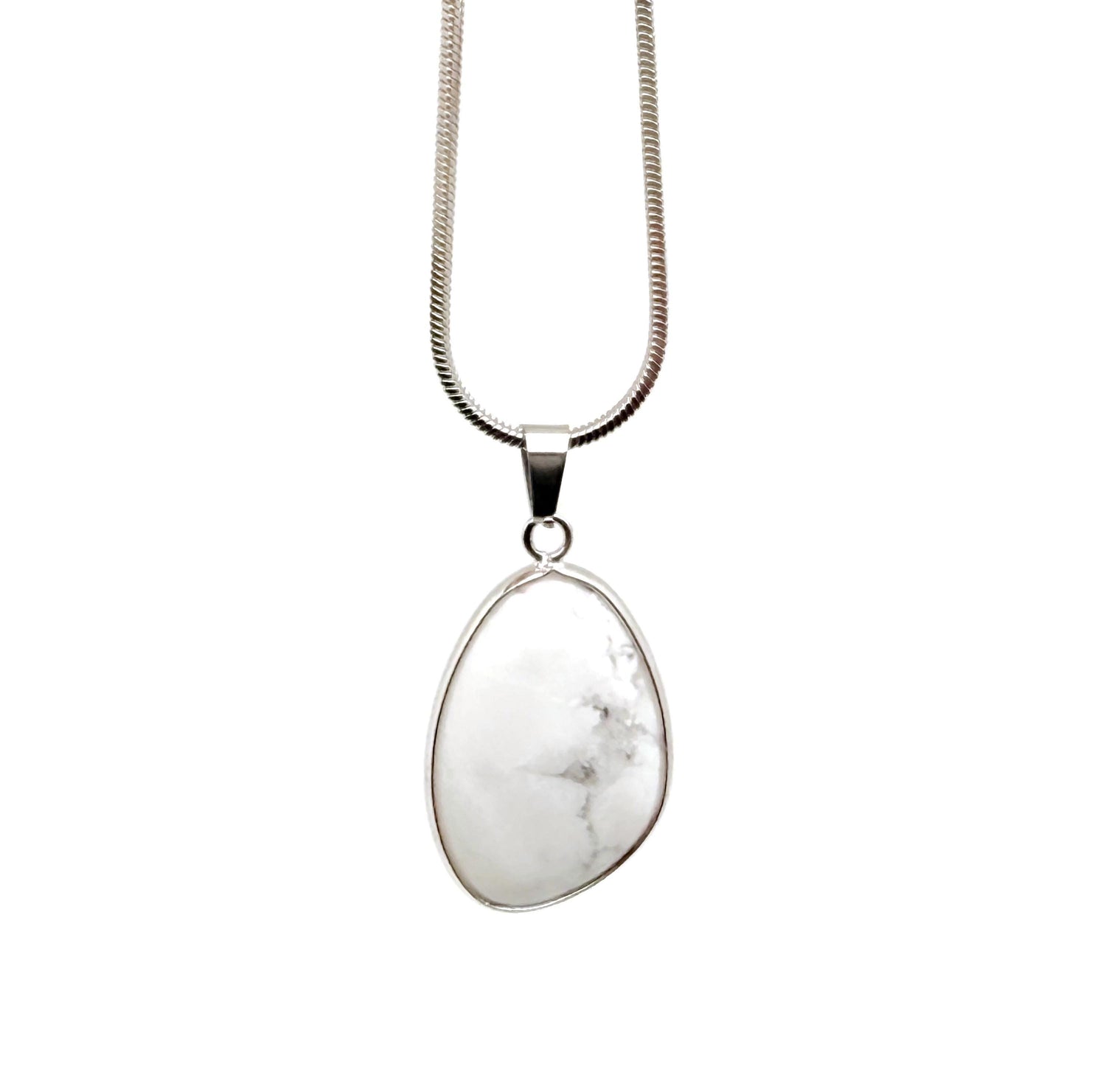 Dainty Howlite silver gemstone pendant from GemstoneGO, showcasing a smooth white stone charm with silver setting for jewelry making