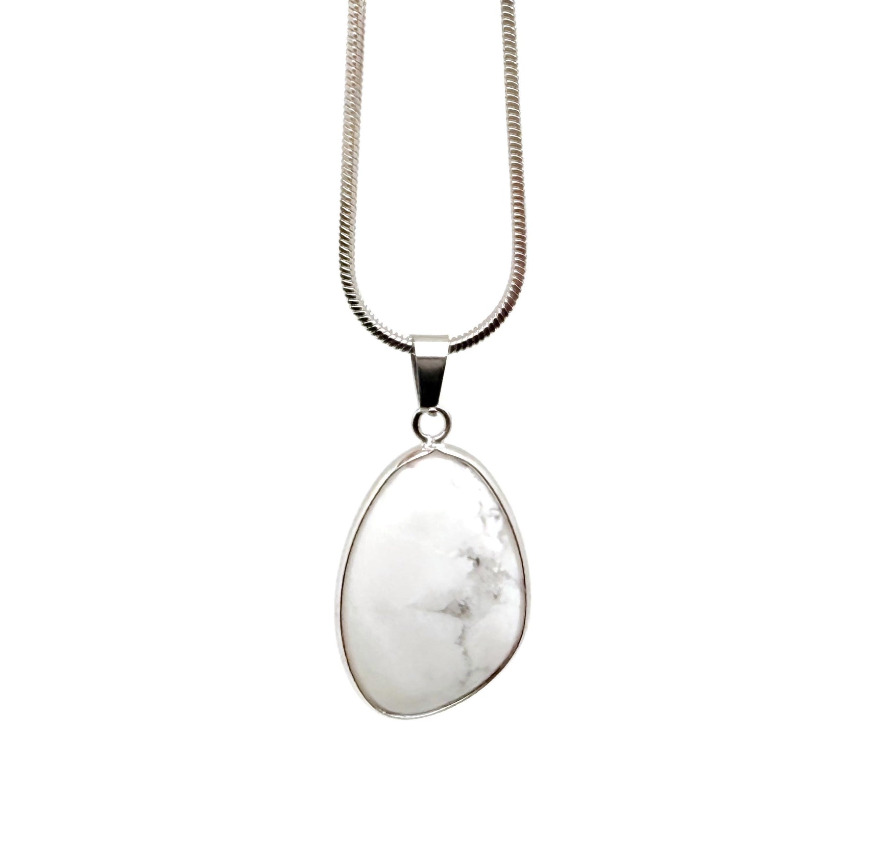Dainty Howlite silver gemstone pendant from GemstoneGO, showcasing a smooth white stone charm with silver setting for jewelry making