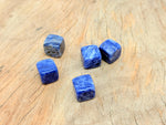 Handmade 16mm Sodalite cube stone with carved details, showcasing deep blue and white mineral patterns from GemstoneGO.