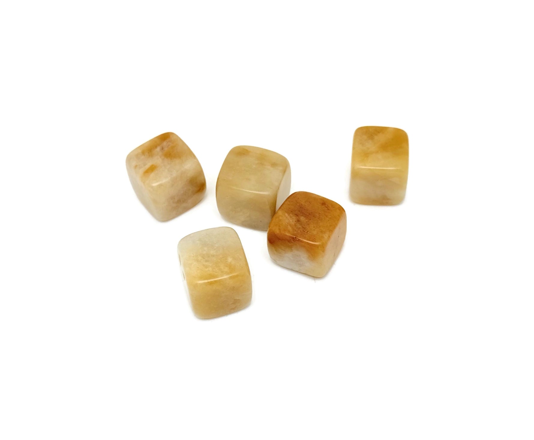 Handmade 16mm yellow jade cube stone with carved details, showcasing its smooth, polished surface and vibrant yellow color.
