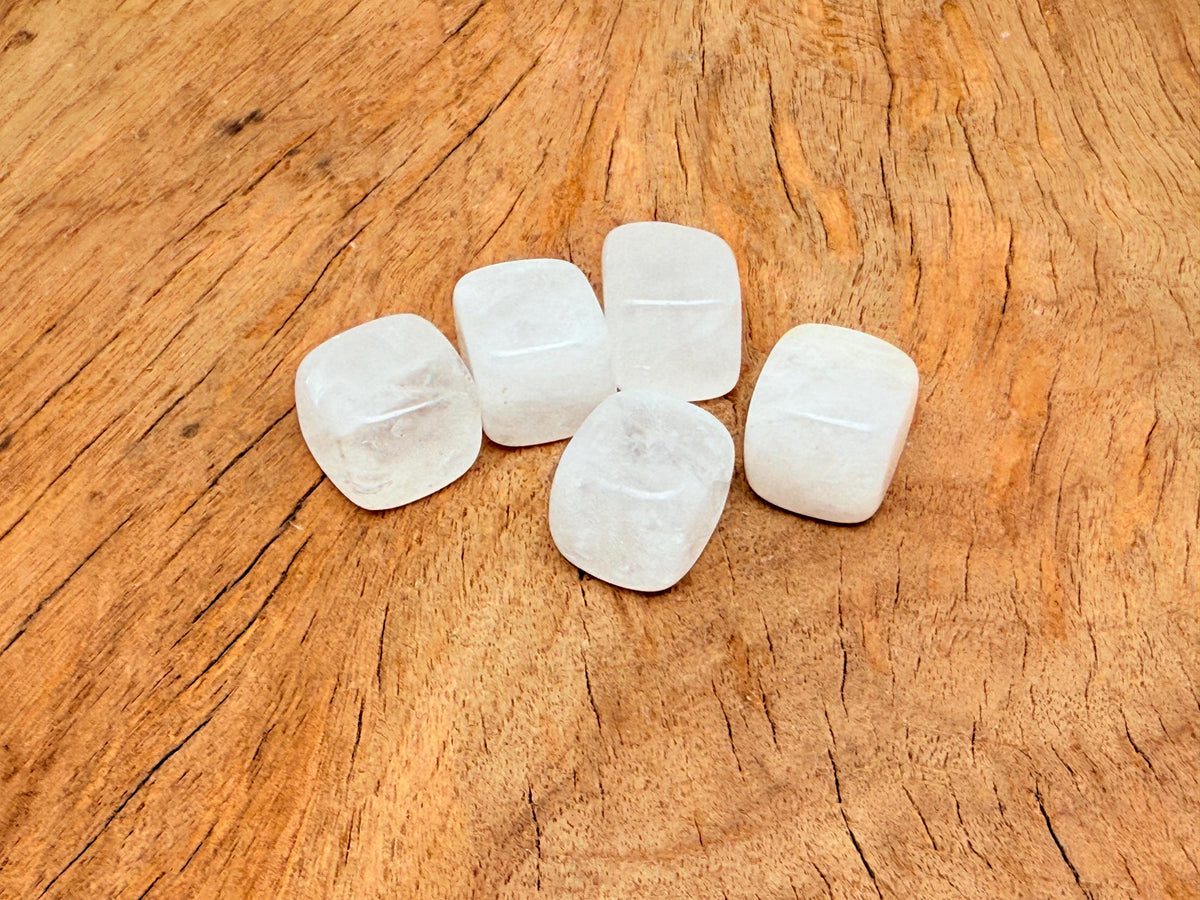 Handmade 16mm clear quartz cube stone from GemstoneGO, showcasing its smooth, carved, transparent crystal surface.