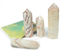 Dali Jasper obelisk tower crystal from GemstoneGO, featuring earthy pork stone with natural patterns and polished surface.