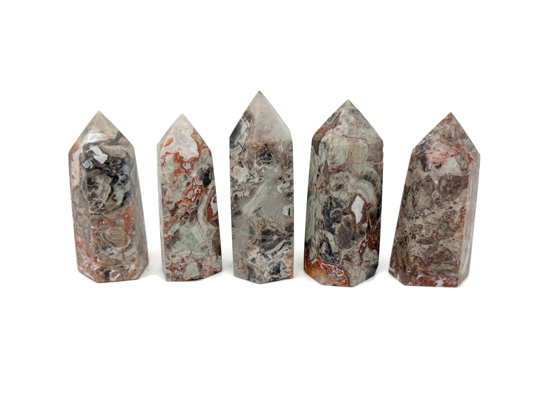 Leopard skin jasper obelisk tower crystal by GemstoneGO, featuring a polished, natural stone with distinctive spotted pattern.