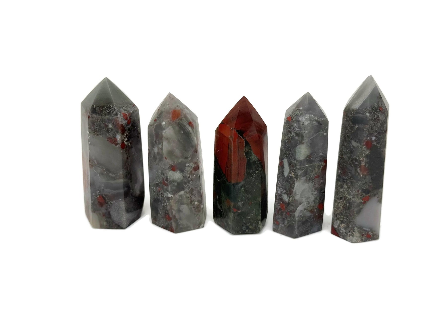 African Bloodstone obelisk tower crystal from GemstoneGO, featuring a deep green stone with red veining and a polished obelisk shape.