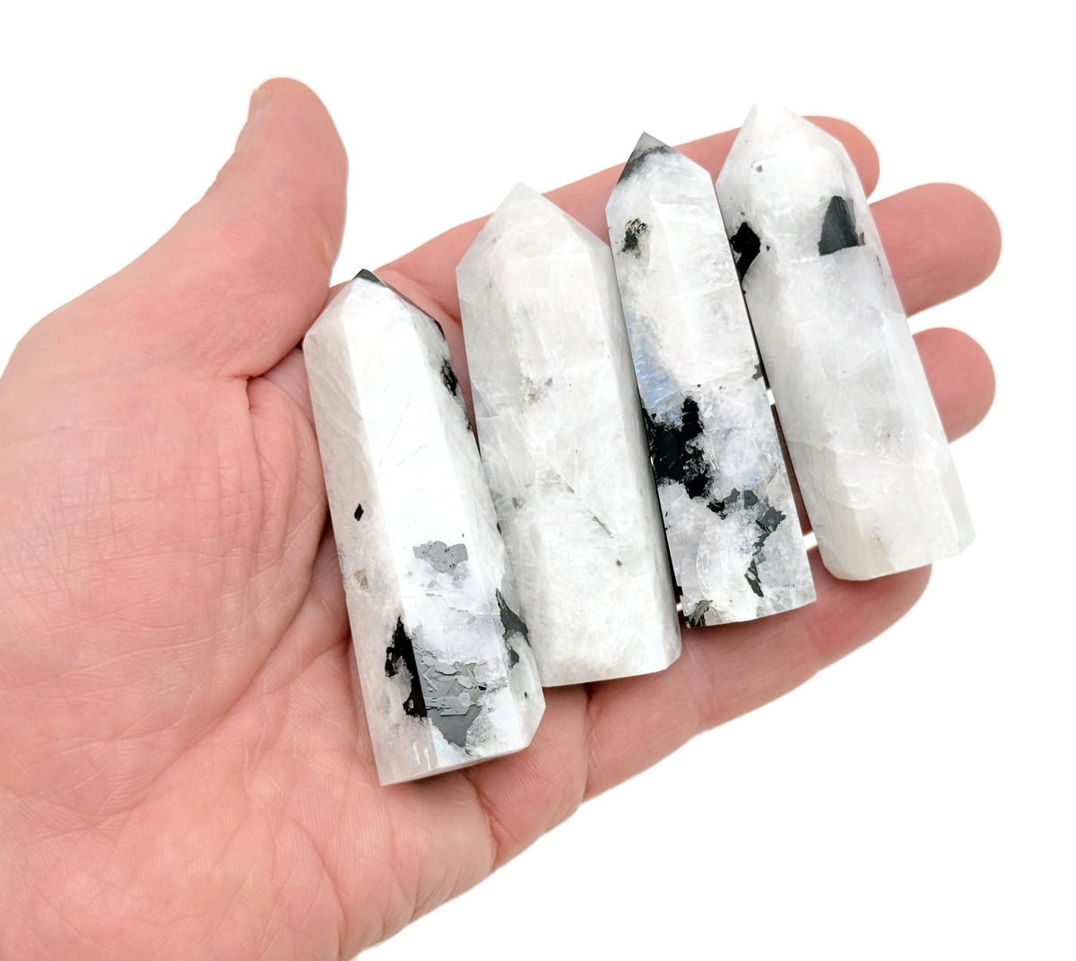 Rainbow Moonstone obelisk tower crystal from GemstoneGO, featuring a smooth, polished surface with shimmering rainbow hues.