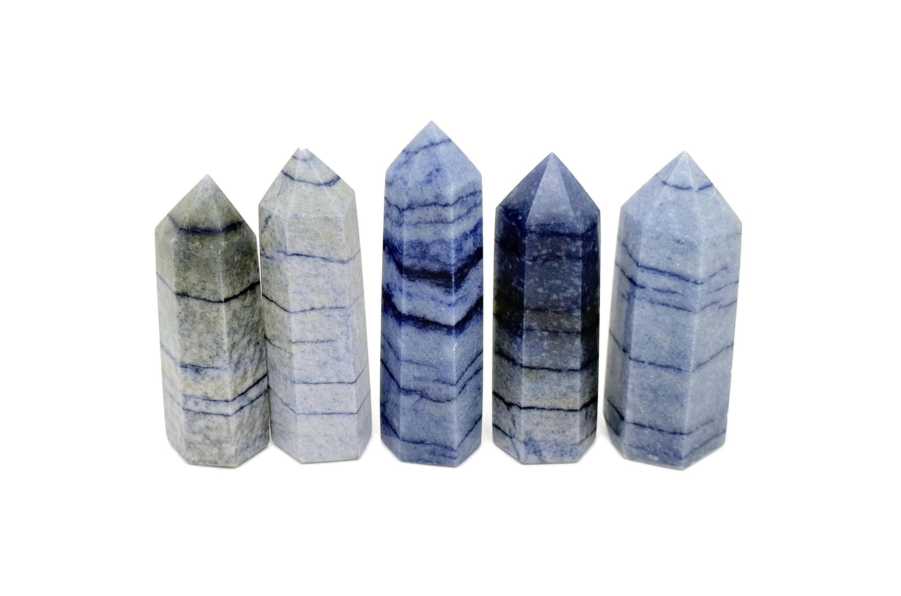 Blue aventurine obelisk tower crystal from GemstoneGO, showcasing a polished blue gemstone obelisk with natural stone texture.
