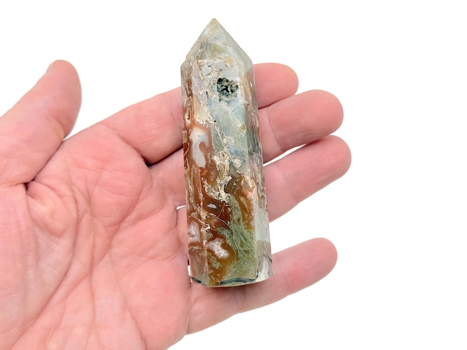 Water grass agate obelisk tower crystal from GemstoneGO, showcasing vibrant green and intricate natural banding on a polished stone.