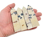 Picture Jasper obelisk tower crystal from GemstoneGO, showcasing natural earthy tones and detailed stone texture.