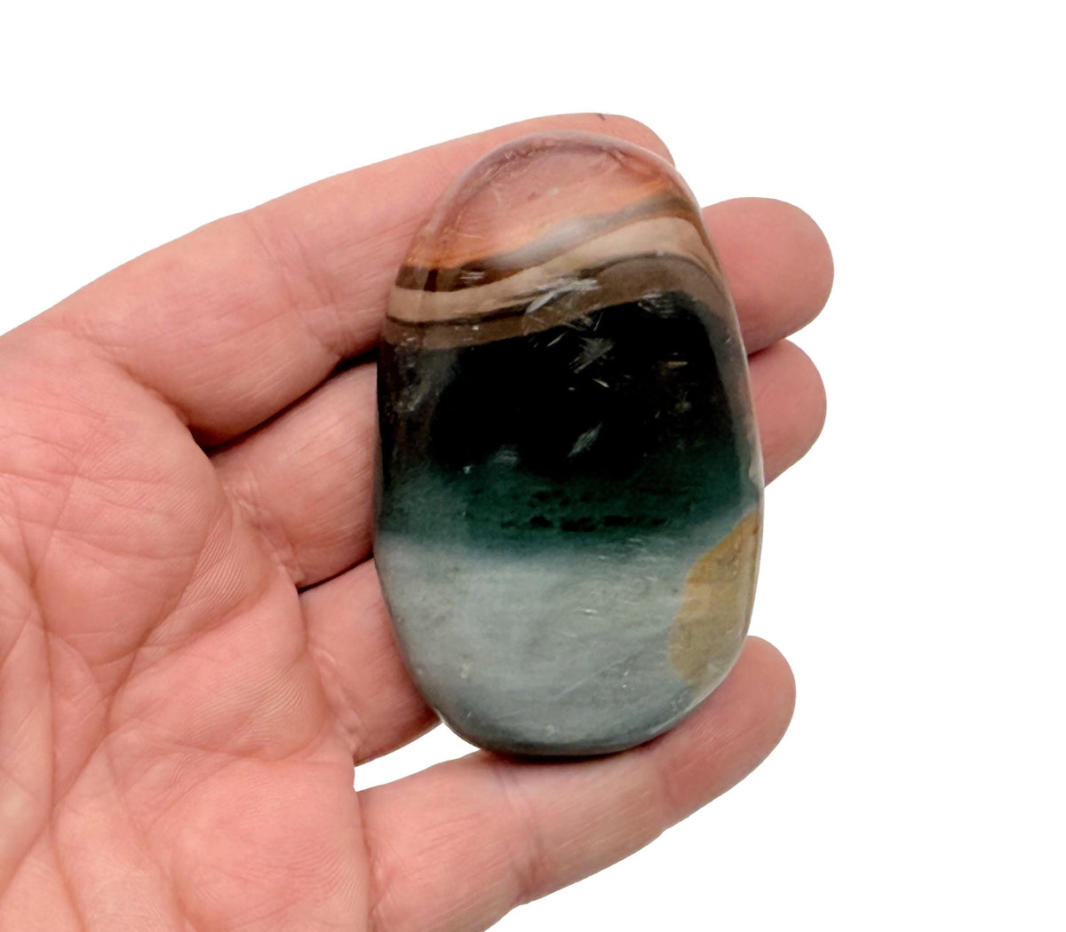 Ocean Jasper palm gemstone spa stone from GemstoneGO, smooth, round mineral with colorful natural patterns and polished surface.