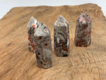 Leopard Skin Jasper obelisk tower crystal from GemstoneGO, showcasing natural patterns and rich earthy tones.