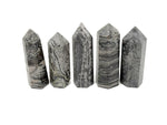 Picasso Jasper obelisk tower crystal from GemstoneGO featuring colorful, polished gemstone with natural patterns and a pointed top.