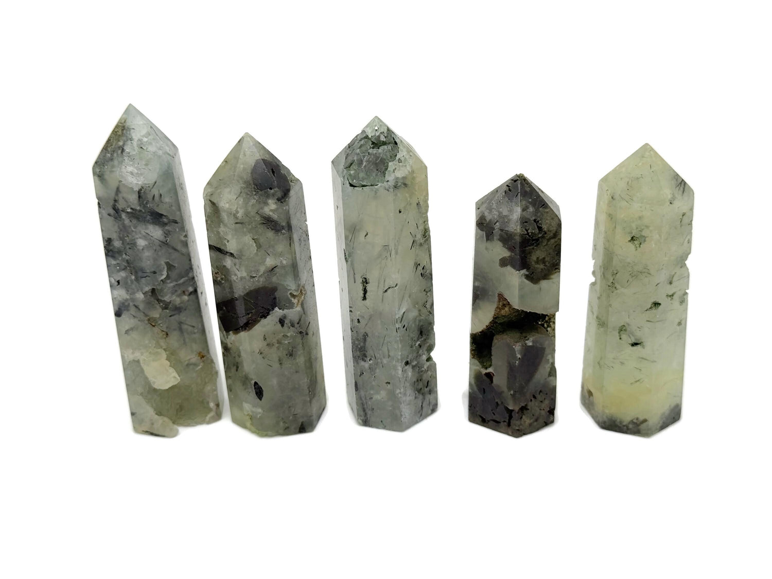 Prehnite obelisk tower crystal from GemstoneGO, showcasing smooth green mineral with natural stone textures and polished surfaces.