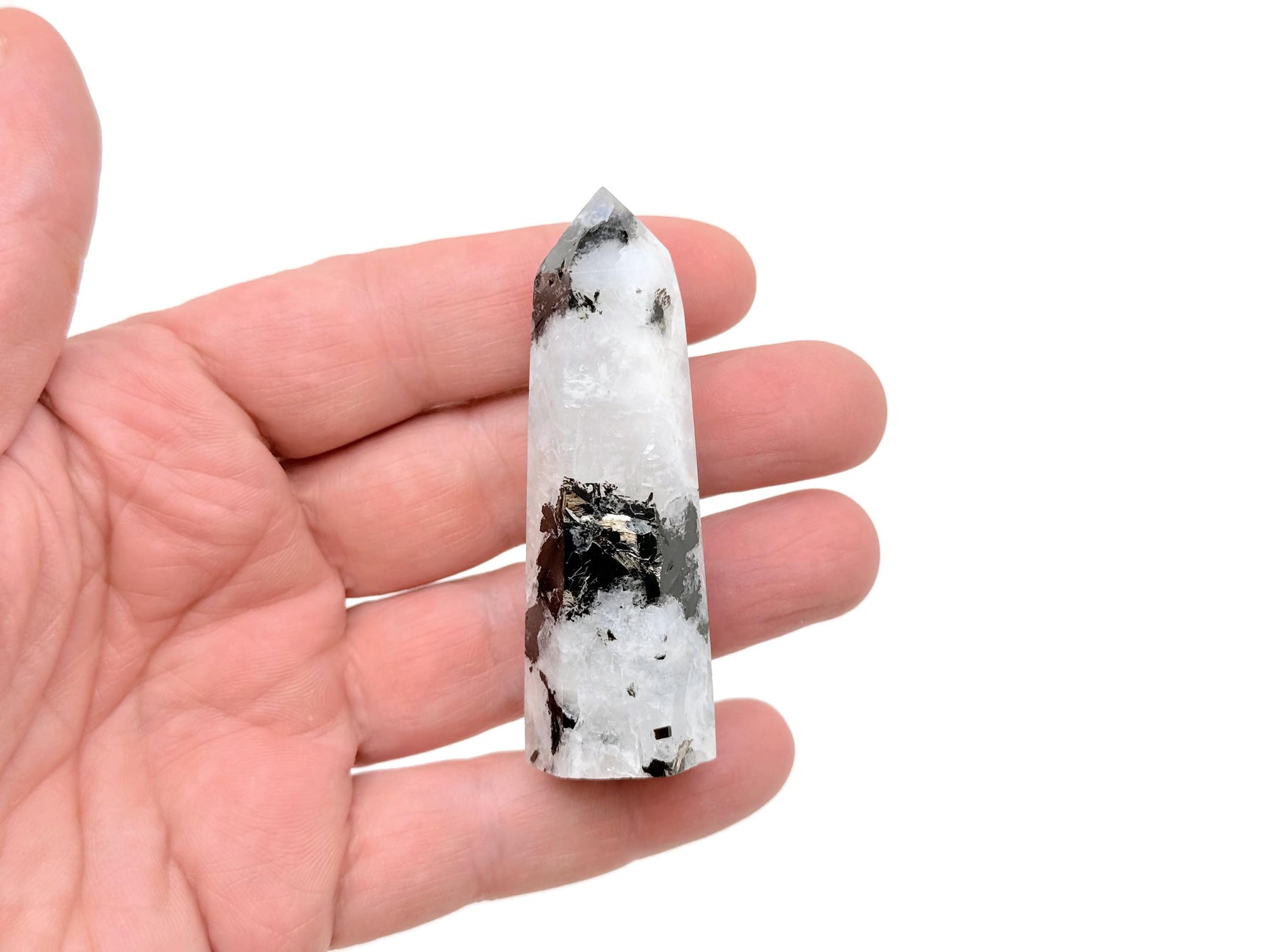 Rainbow moonstone obelisk tower crystal from GemstoneGO, showcasing a polished, iridescent gemstone with a pointed obelisk shape.