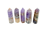 Amethyst and Crazy Lace Agate obelisk tower crystal from GemstoneGO, featuring vibrant purple and intricate gemstone patterns.
