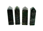 Emerald quartz obelisk tower crystal from GemstoneGO, showcasing a polished green gemstone with natural crystal formations.