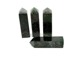 Emerald Quartz obelisk tower crystal from GemstoneGO, with a polished green quartz gemstone in a tall, pointed obelisk shape.