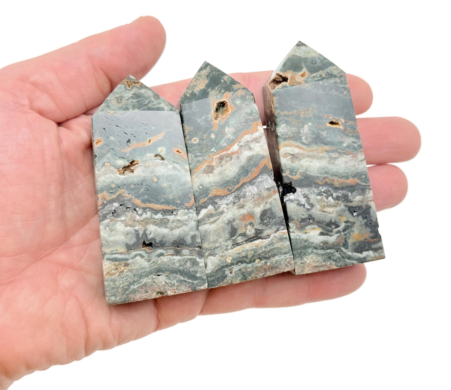 Ocean Jasper obelisk tower crystal by GemstoneGO, featuring colorful swirling patterns and polished smooth surface.