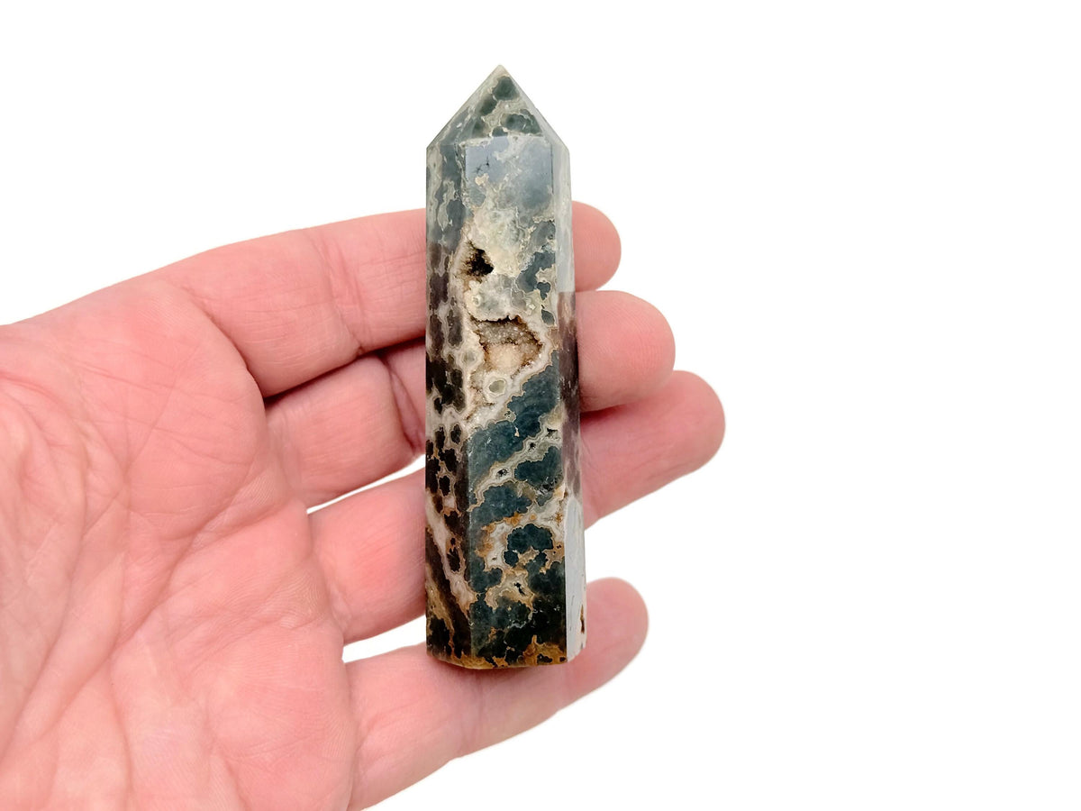 Ocean Jasper obelisk tower crystal by GemstoneGO, showing a polished, colorful stone with natural banding and unique patterns.