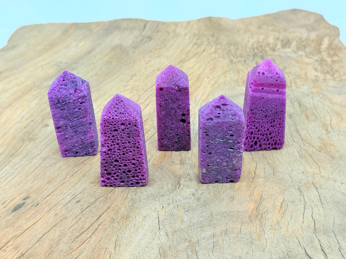 Red Corundum obelisk tower crystal with polished facets and natural gemstone appearance, crafted by GemstoneGO.