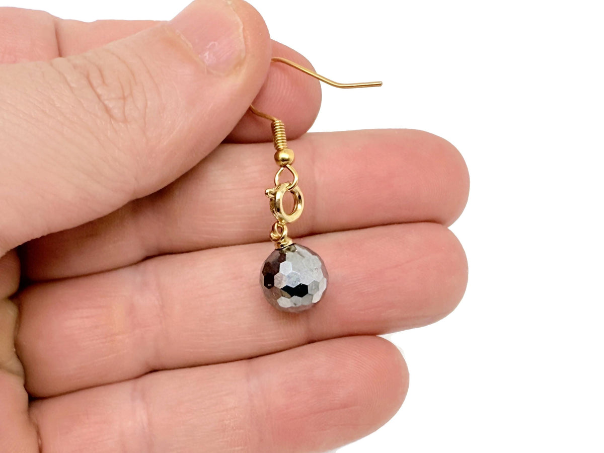 Gold terahertz ball crystal earrings with gemstone accents, stylish jewelry perfect for gifting or everyday wear.