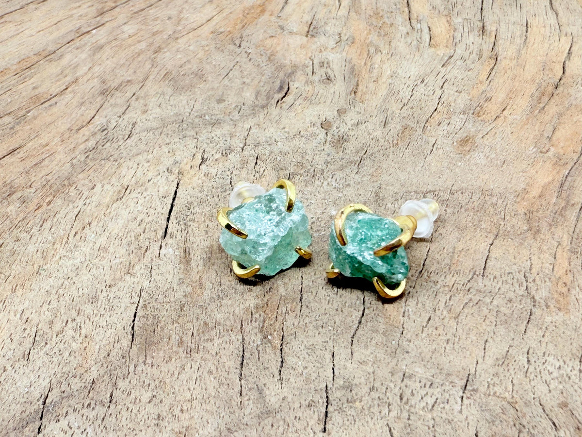 Rough crystal stud earrings with gold detailing by GemstoneGO, minimalist jewelry with natural crystal textures and gold accents.