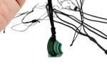 Malachite crystal necklace with adjustable cord from GemstoneGO, featuring a polished green gemstone pendant.