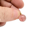 Strawberry Quartz pendant by GemstoneGO featuring a polished, heart-shaped gemstone for positivity and healing.