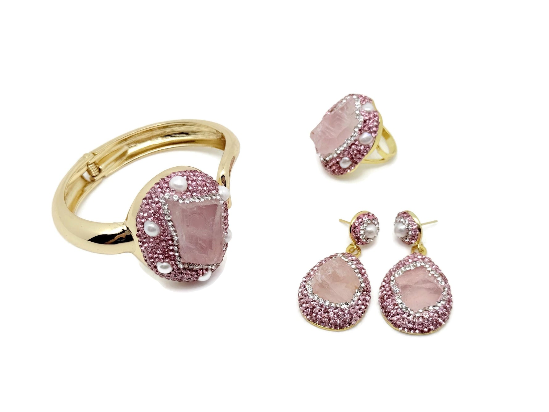 Rose quartz jewelry set featuring a necklace and earrings from GemstoneGO, showcasing polished pink gemstone jewelry.
