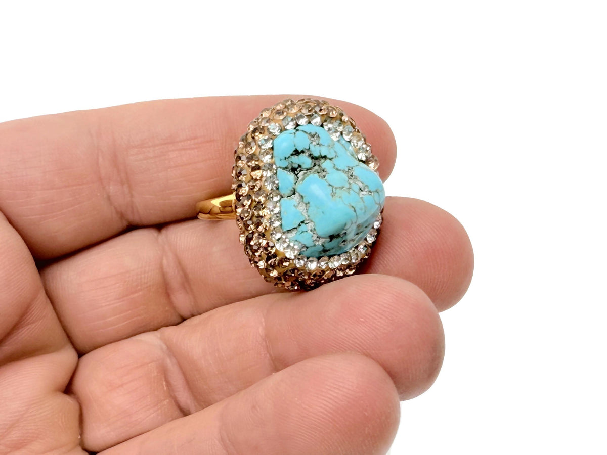 Turquoise jewelry set with crystal accents from GemstoneGO, includes necklace and earrings displayed on a neutral background.