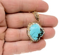 Turquoise jewelry set with crystal accents from GemstoneGO, featuring matching necklace and earrings on a white background.