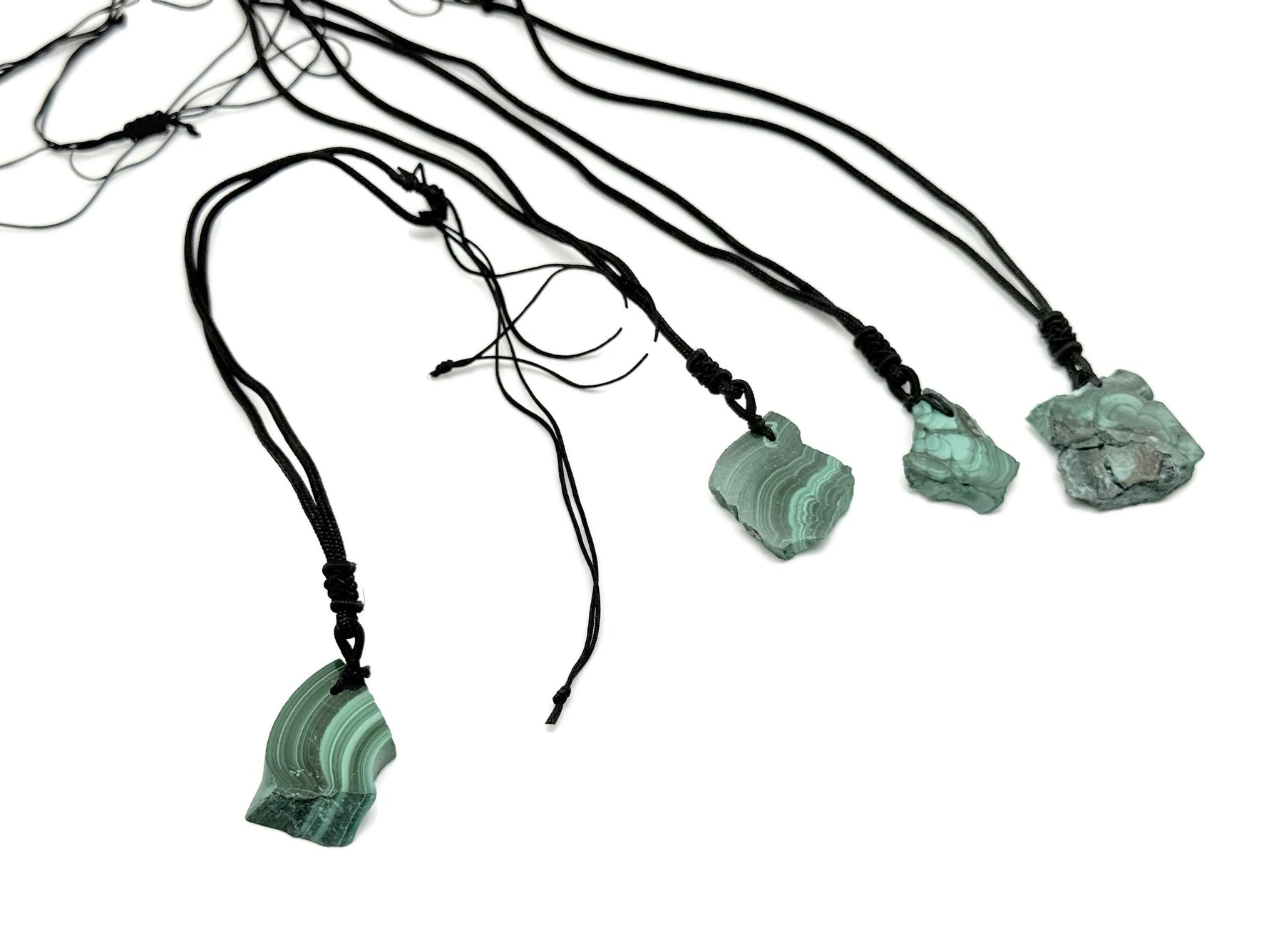 Malachite crystal necklace with an adjustable cord from GemstoneGO, showcasing a vibrant green polished gemstone pendant.