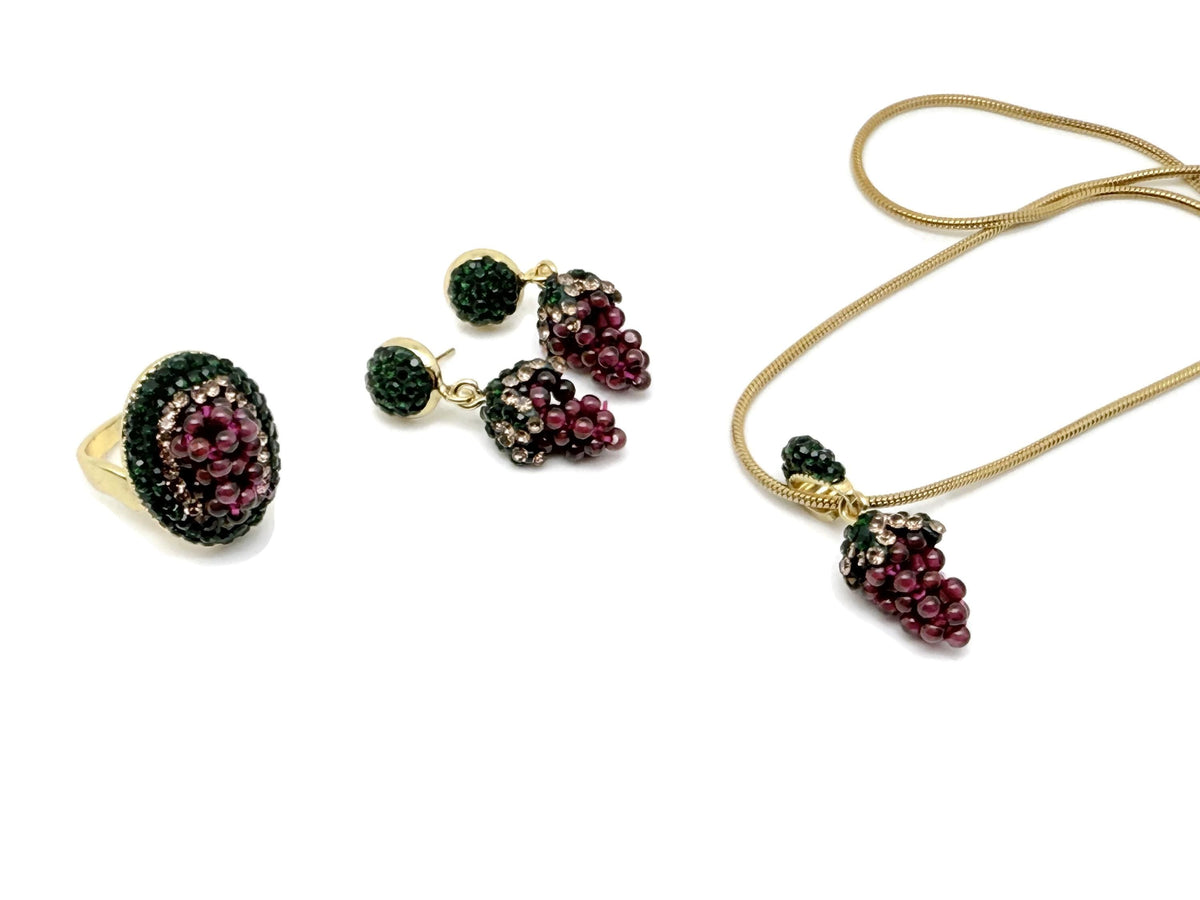 Garnet Grape jewelry set by GemstoneGO featuring a necklace and earrings with deep red garnet stones and crystal accents.