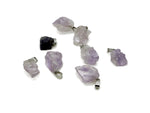 Amethyst crystal pendant from GemstoneGO, showcasing a polished purple gemstone with a silver bail for jewelry making.
