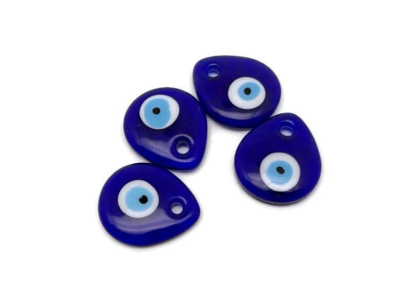 Blue glass evil eye charm with hole for hanging, Turkish Nazar amulet for protection and home decor by GemstoneGO