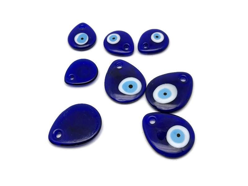 Drop Blue Glass Evil Eye charm from GemstoneGO featuring a blue Nazar design with a hole for home decor or jewelry use.